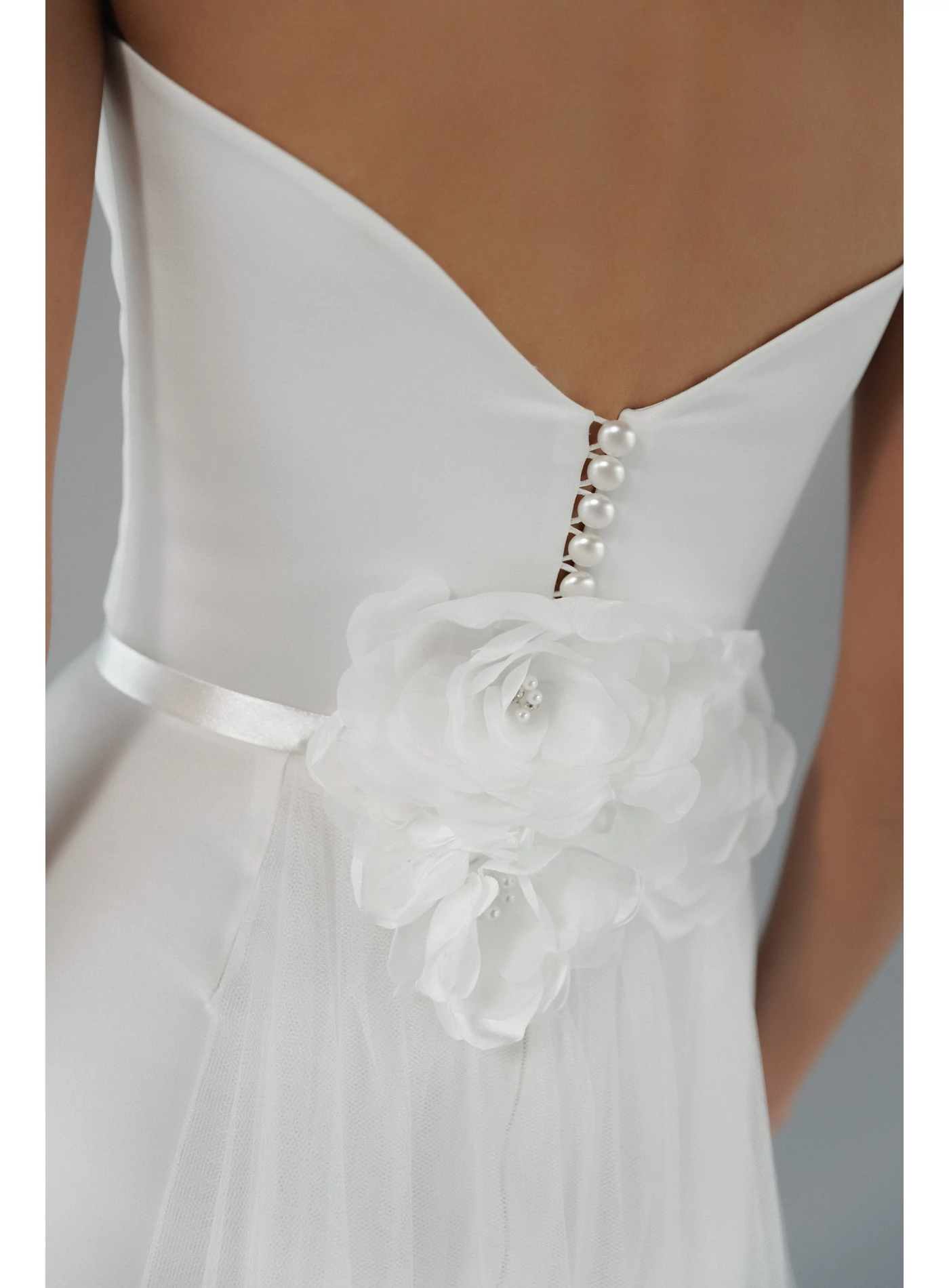 Tulle overskirt with satin belt