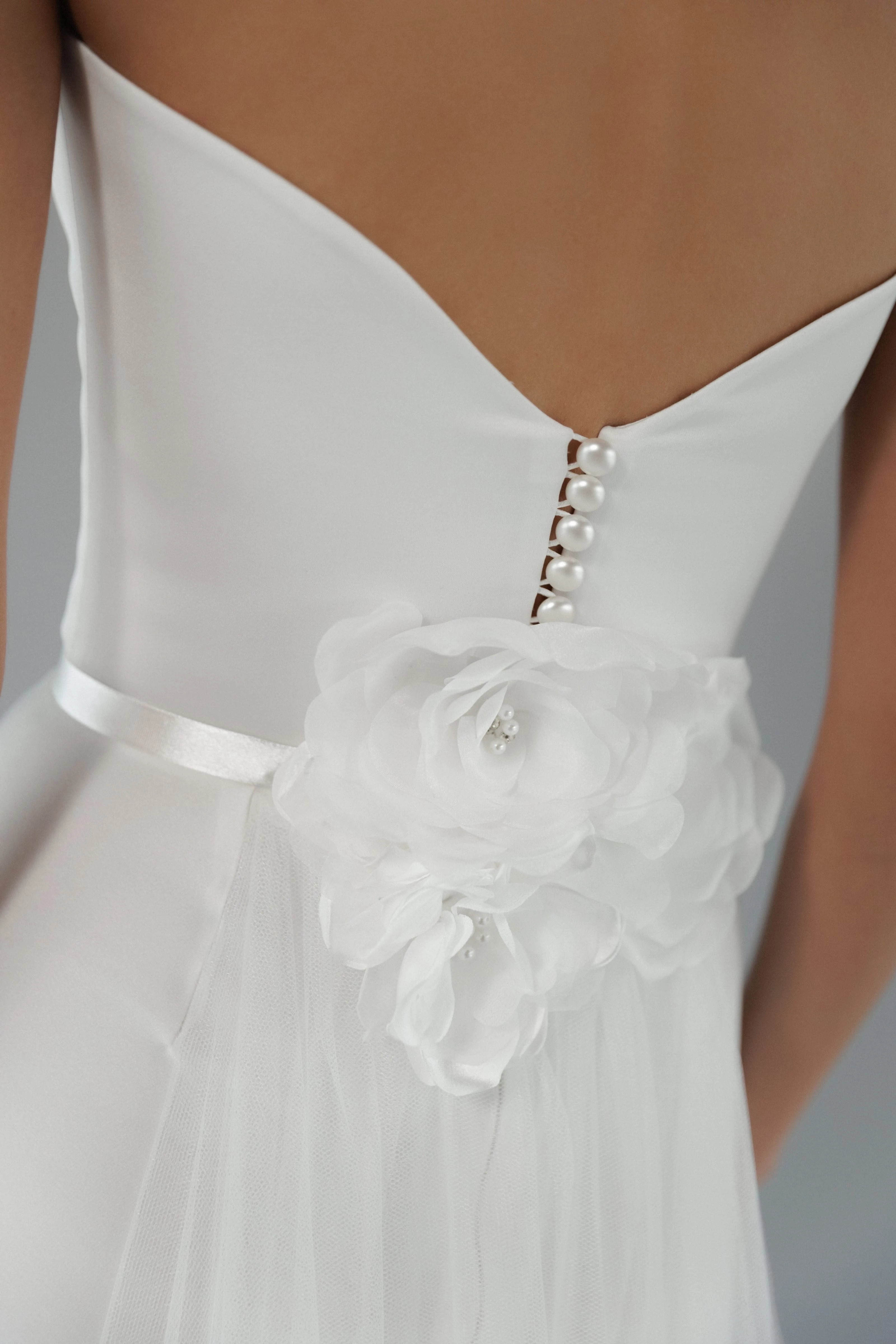Tulle overskirt with satin belt
